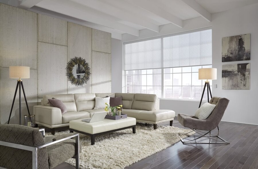 A living space featuring custom window treatments from Lutron